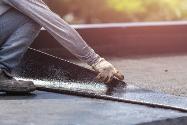 Professional Exterior Waterproofing technician working in Midland, OH